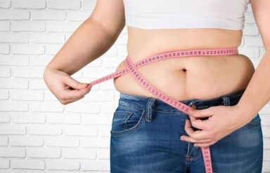 Fat deposits in the waist.